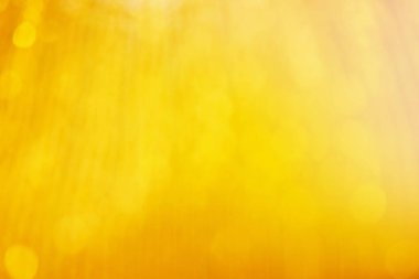 Altın rengi arka plan bulanık odak bokeh için şablon ışık ile