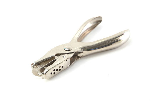 metal paper punch isolated on white background