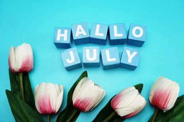 hello July alphabet letter on blue background