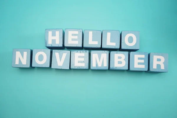 Hello November Alphabet Letter Blue Background — стоковое фото