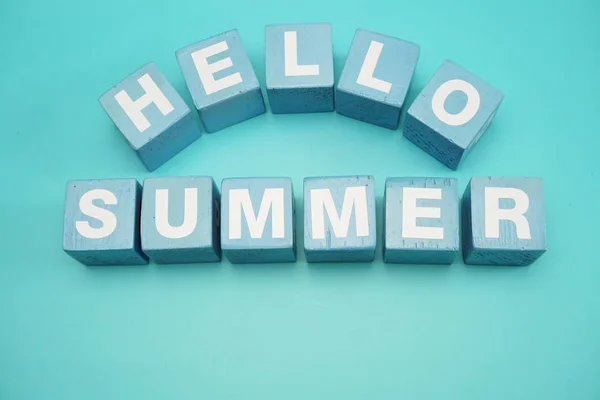 Hello Summer alphabet letter on Blue background
