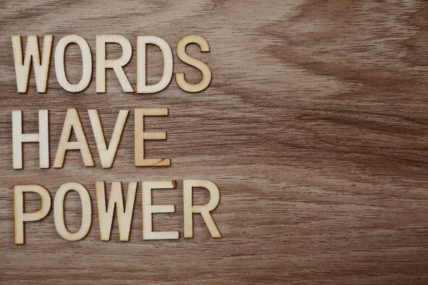 Words Have Power alphabet letters on wooden background business concept