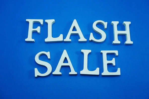 Flash Sale alphabet letters on blue background business concept