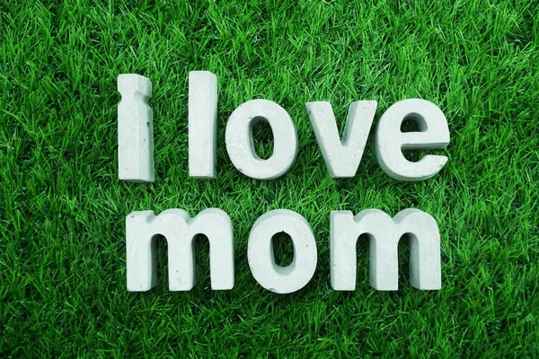 Love Mom Made Concrete Alphabet Top View Green Grass — Stock Photo, Image