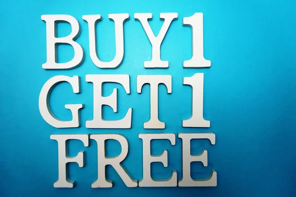 Buy one Get one Free Sale Promotion on blue background