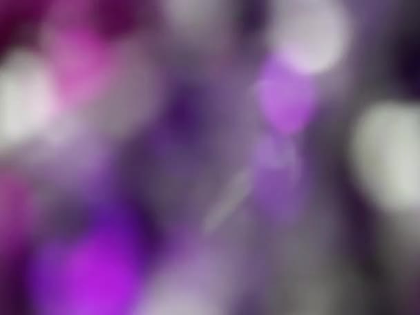 粉红色和紫色抽象模糊光散景灯旋转背景 — 图库视频影像
