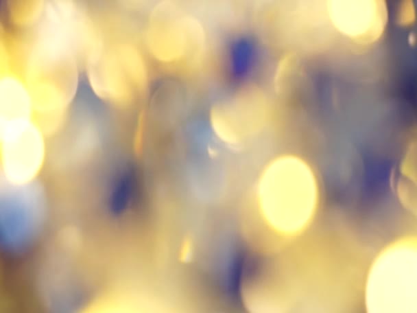 Résumé Le Bokeh jaune illumine le fond des vacances de Noël — Video