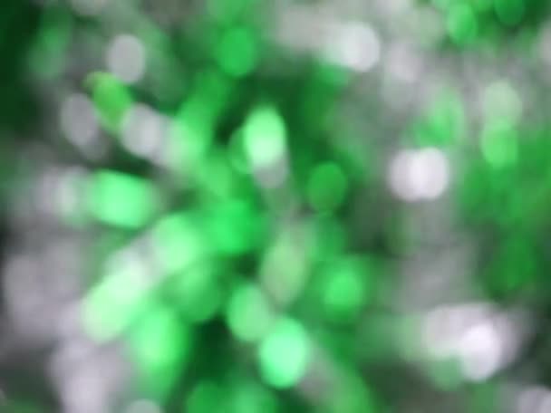 Grün abstrakt blaues Licht Bokeh Lichter Rotation Hintergrund — Stockvideo