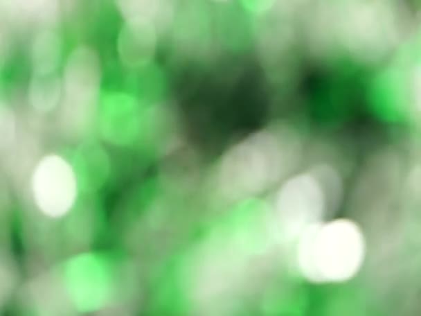 Verde Luz borrosa abstracta luces bokeh fondo de rotación — Vídeo de stock