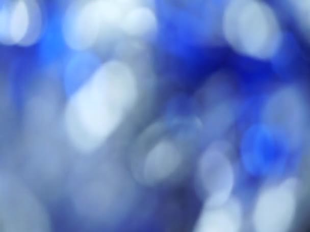 Синий абстрактный размытый свет боке огней фон вращения — стоковое видео