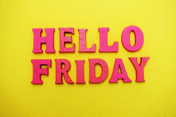 Hello Friday alphabet letters on yellow background