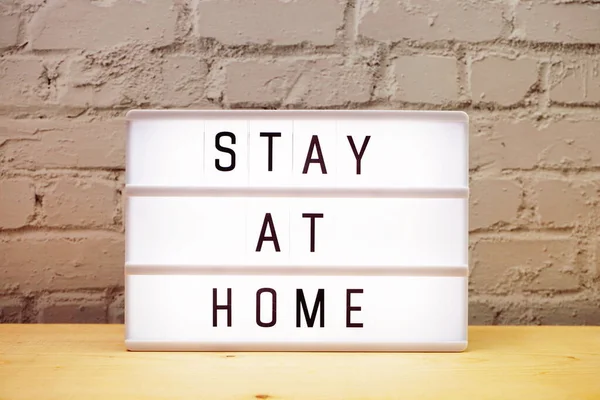 Stay Home Word Letter Light Box White Brick Wall Background — Stock Photo, Image