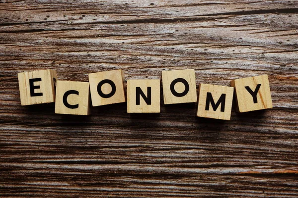 Economy Alphabet Letter Wooden Background — Stock Photo, Image