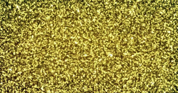 Золотий блиск сяє тлом. Золоті блискучі блискітки і сяючий мерехтливий розкішний фон — стокове фото