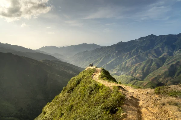 majestic scenery of Ta Xua mountain. Travelers experience on the trail of dinosaurs spine and the top of the mountains Ta Xua. This is a very popular tourist destination in Son La province, Vietnam