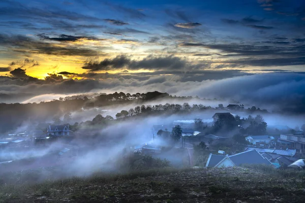 A magical image of a clouded valley in the early morning in Da lat town, Vietnam