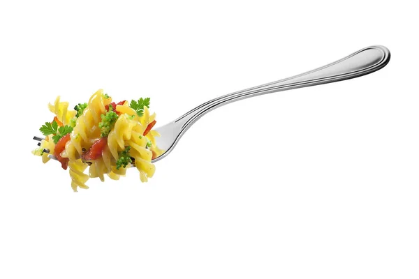 Fork with fusilli pasta broccoli tomatoes and aromatic herbs — Stock Photo, Image