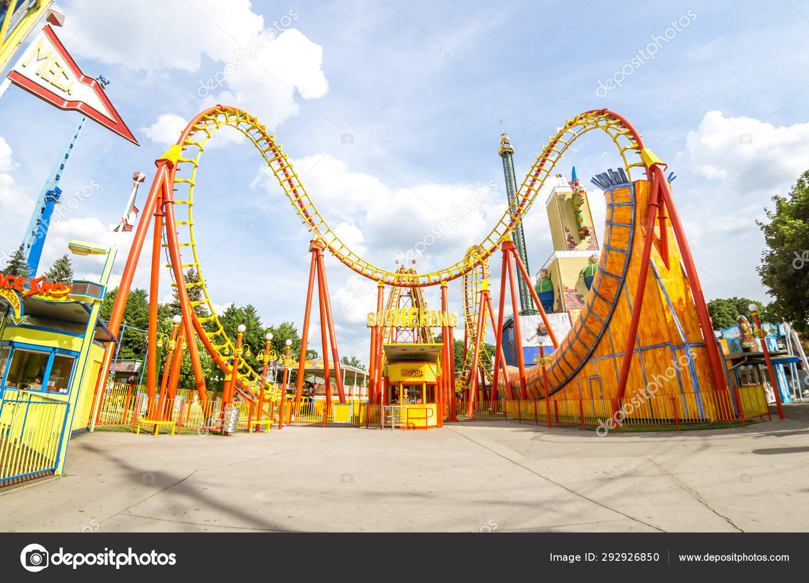 Super wide view of a colorful roller coaster in Prater amusement