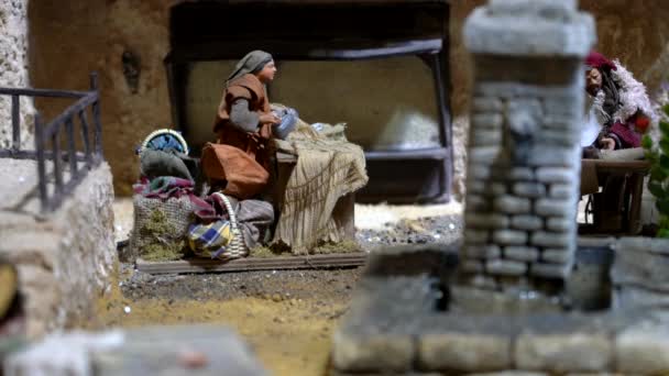 Il più grande presepe animato del Sud America. Donna ferro da stiro vestiti . — Video Stock