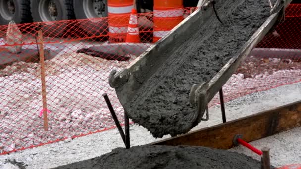 Middlebury, Vermont - 20181010 - Close up of Cement Truck Dumping Concrete For New Sidewalk Construction — стоковое видео