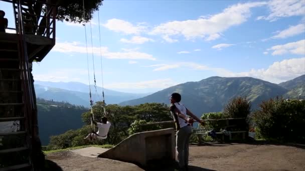 Banos, Ecuador - 20180924 - Man Gets Huge Jumping Push Assist on Casa de Arbol Swing. — Stock Video