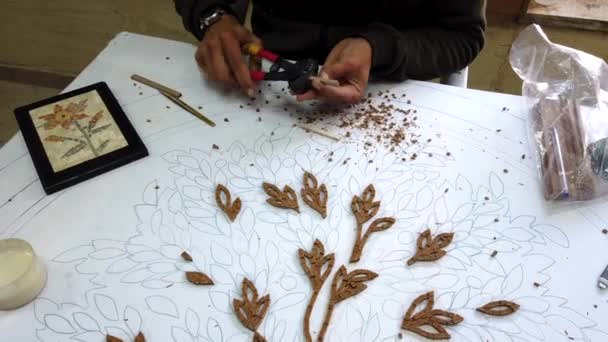 Petra, Jordan - 2019-04-20 - Mosaic 1 - Artists Glues Pieces for Flower Plaque — Stock Video