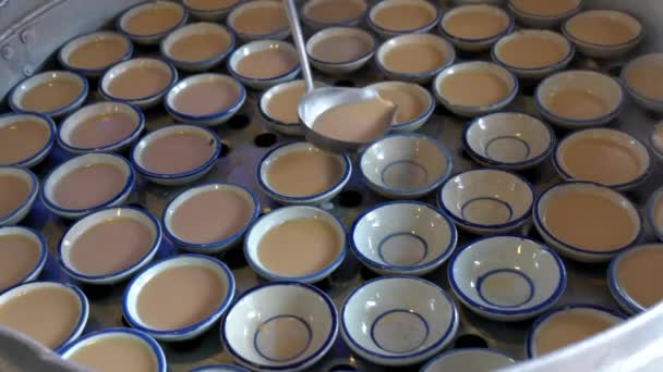 Woman Pours Pudding Into Bowls to Cook for Lunch Snack — Stock Video