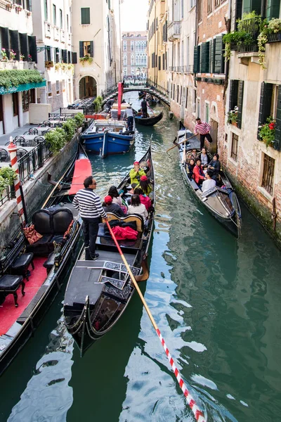 Venice, Italy - May 1, 2017: Gondolas are congested, yet try to work together to keep traffic flowing — Stock Photo, Image