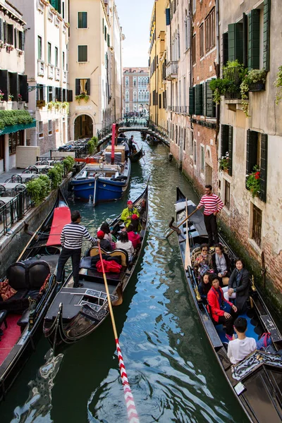 Venice, Italy - May 1, 2017: Gondolas are congested, yet try to work together to keep traffic flowing — Stock Photo, Image