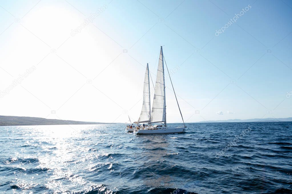 Sailing boats ships on open sea