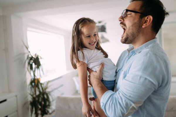 Happy family having fun time together at home