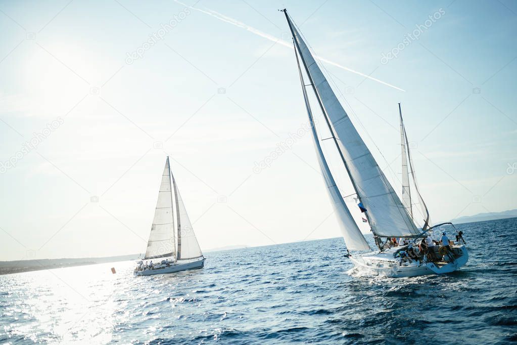 Portrait of sailing boats ships on open sea