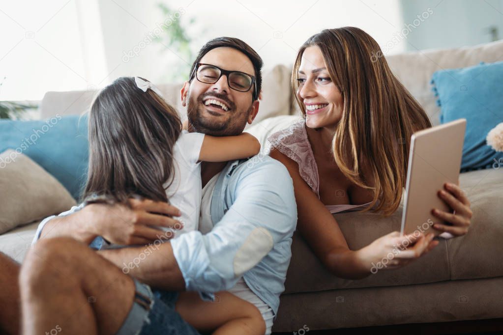 Happy family having fun time together at home