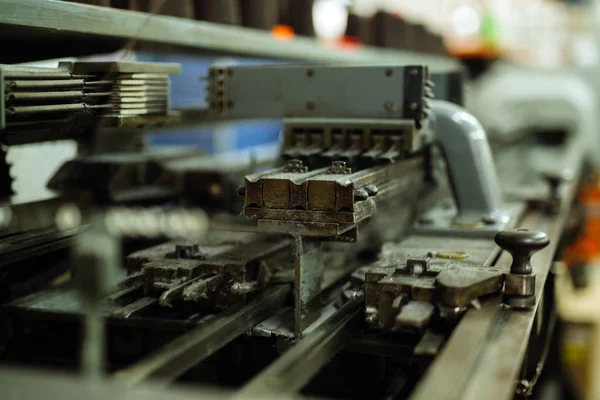 Old dusty knitting machine in function factory