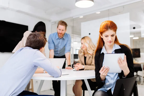 Compañeros Negocios Sentados Escritorio Con Tecnología Mano — Foto de Stock