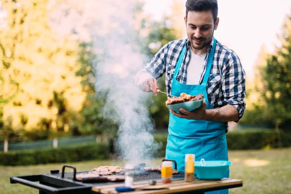 Handsome Happy Male Preparing Barbecue Outdoors Friends — Stock Photo, Image