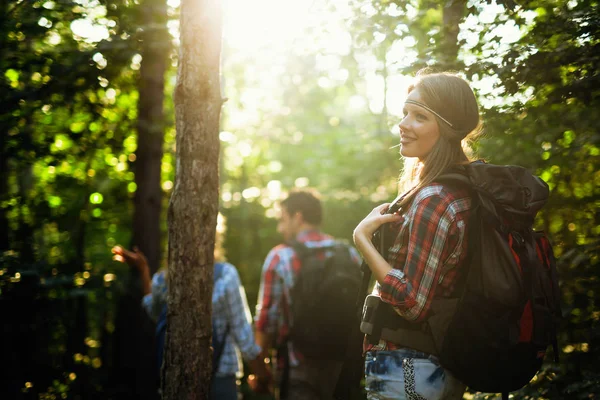 People trekking in forest — Stock Photo, Image