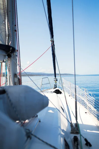 Portrait of sailing sport boat on open sea