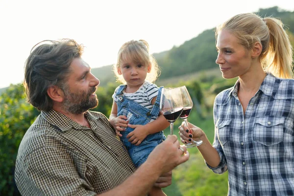 Winegrower family tasting wine — Stock Photo, Image