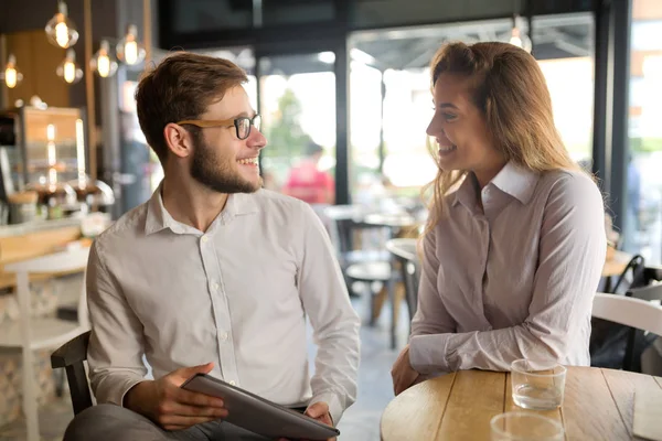 Business people talking and laughing together — Stock Photo, Image