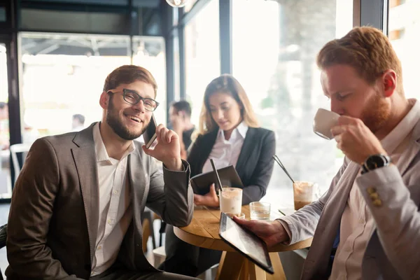 Business people talking and laughing together — Stock Photo, Image