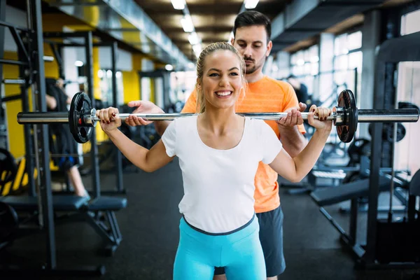 Beautiful Active Woman Doing Squats Weights Gym Her Trainer — Stock Photo, Image