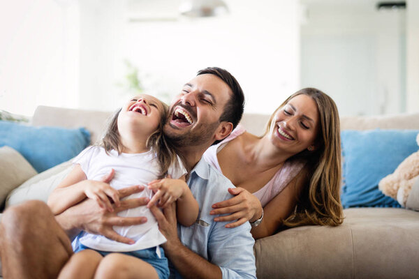 Happy family having fun time together at home