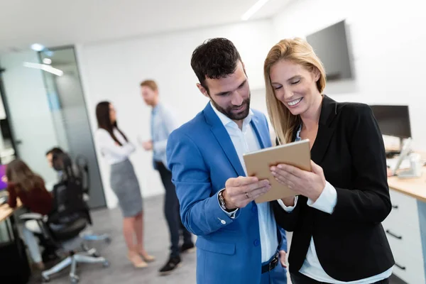 Young Attractive Business Couple Using Tablet Company — Stock Photo, Image