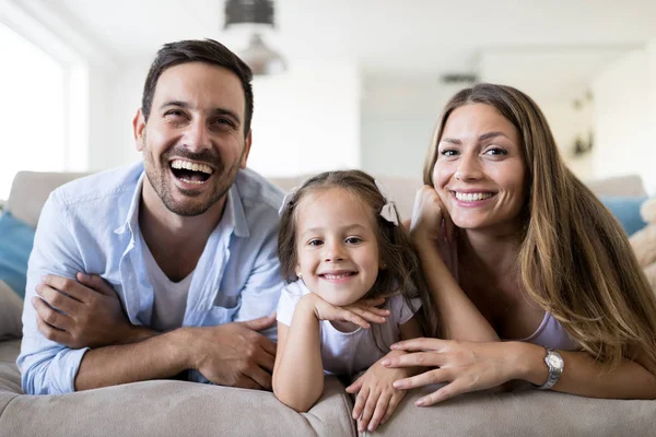 Happy Family Having Fun Time Watching Home — стоковое фото