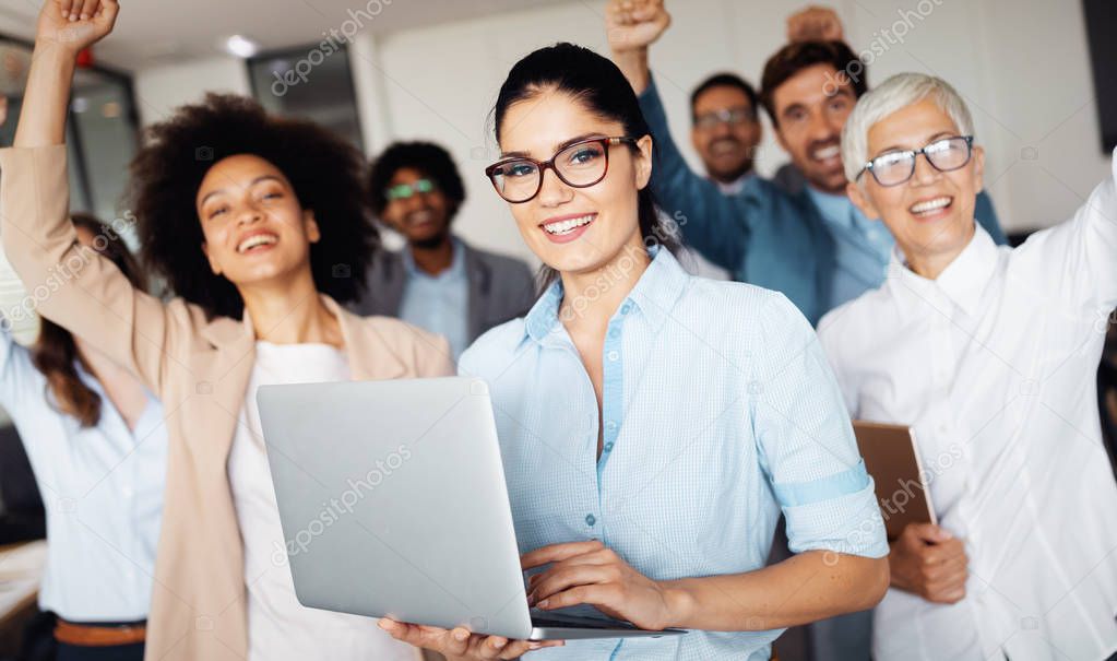 Successful happy business group of people at work in office