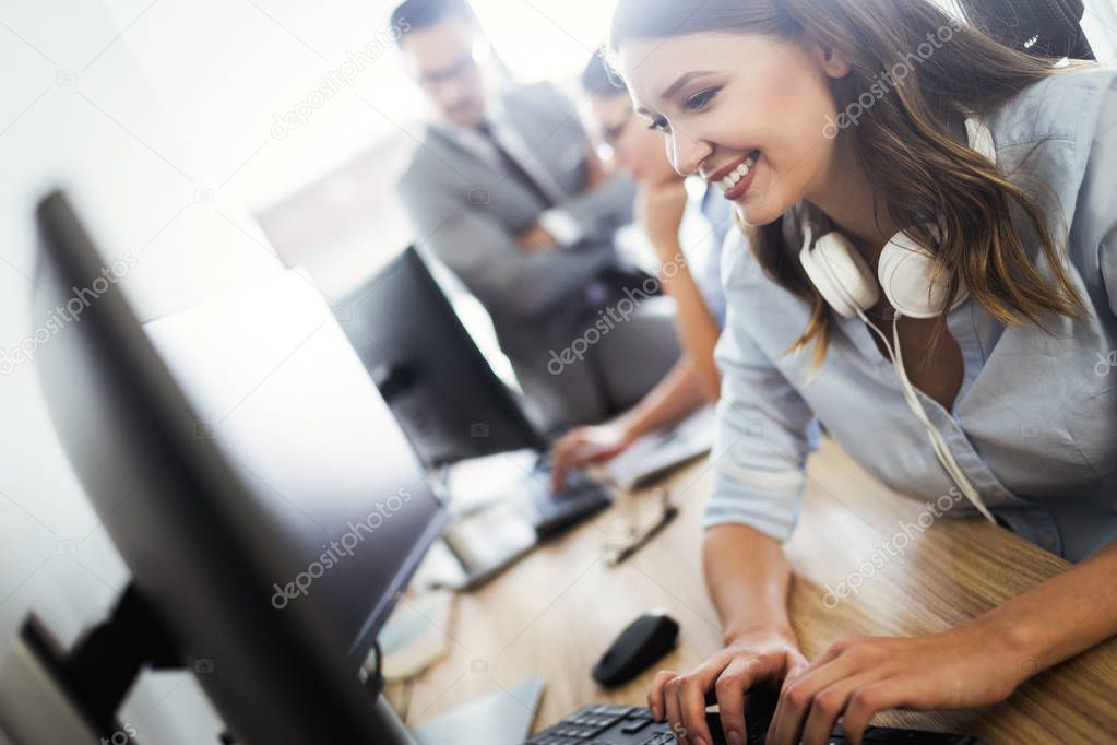 Successful happy business group of people at work in office