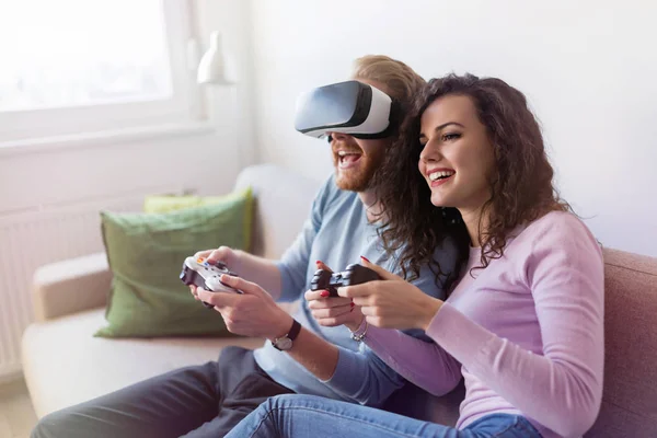 Happy Young Couple Playing Video Games Virtual Reality Headsets Home — Stock Photo, Image