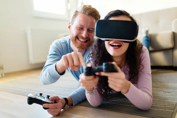 Happy Young Couple Playing Video Games Virtual Reality Headsets Home — Stock Photo, Image