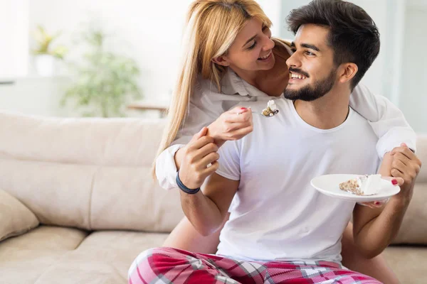 Cute Young Cheerful Couple Spending Time Home Eating Cake — Stock Photo, Image